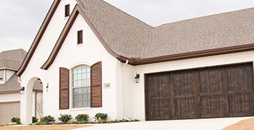 CUSTOM EXTERIOR WINDOW SHUTTERS